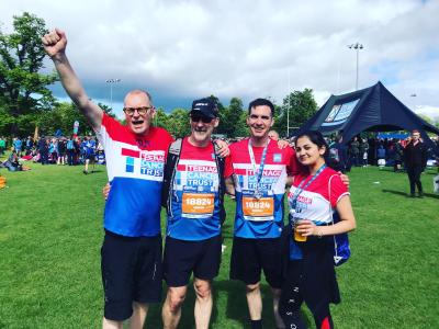 Four Teenage Cancer Trust Edinburgh Marathon Festival runners after finishing their run