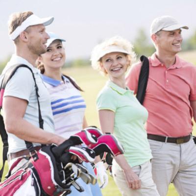 A group of people playing golf