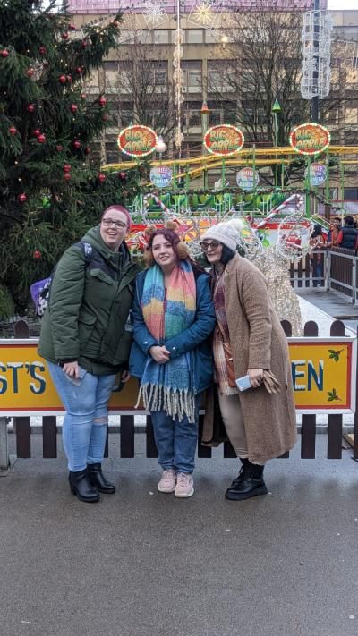 Charlie with their mum and sister 