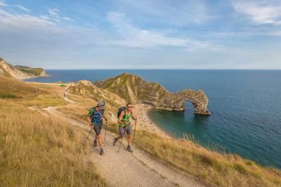 Two participants trek along the Jurassic Coast