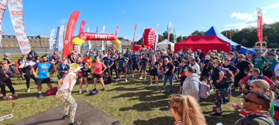 Participants warm up at the start line