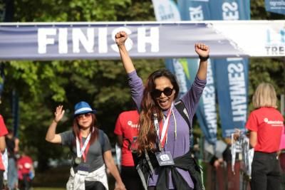 Participant celebrates at the finish line