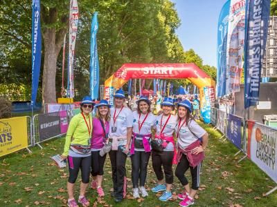 Participants smile at the start line